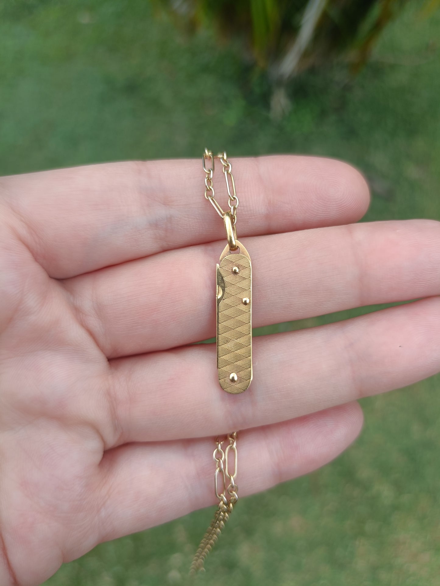 Vintage UNNOARRE 9ct yellow gold miniature folding knife pendant