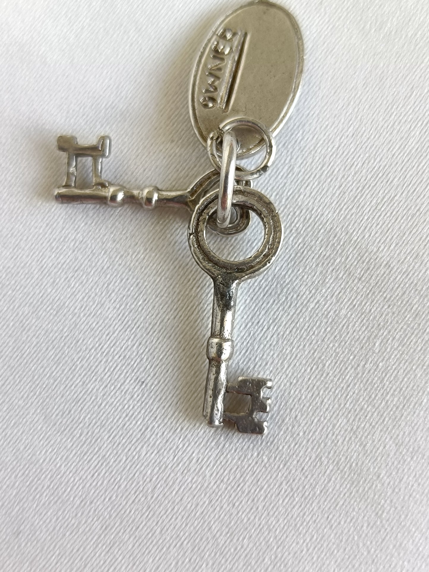 Vintage sterling silver home owner charm