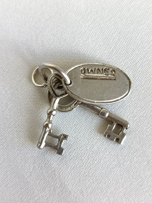 Vintage sterling silver home owner charm