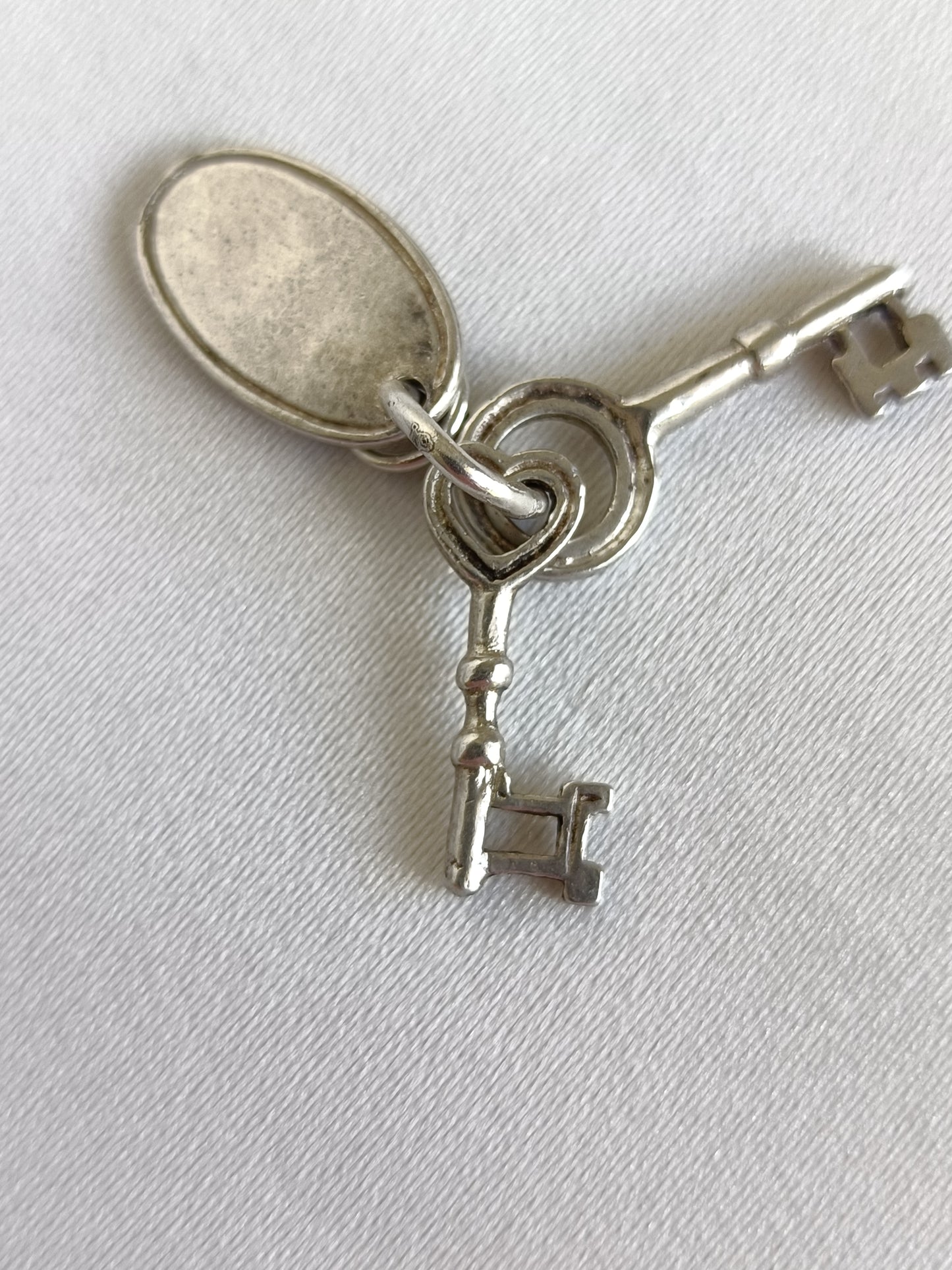 Vintage sterling silver home owner charm