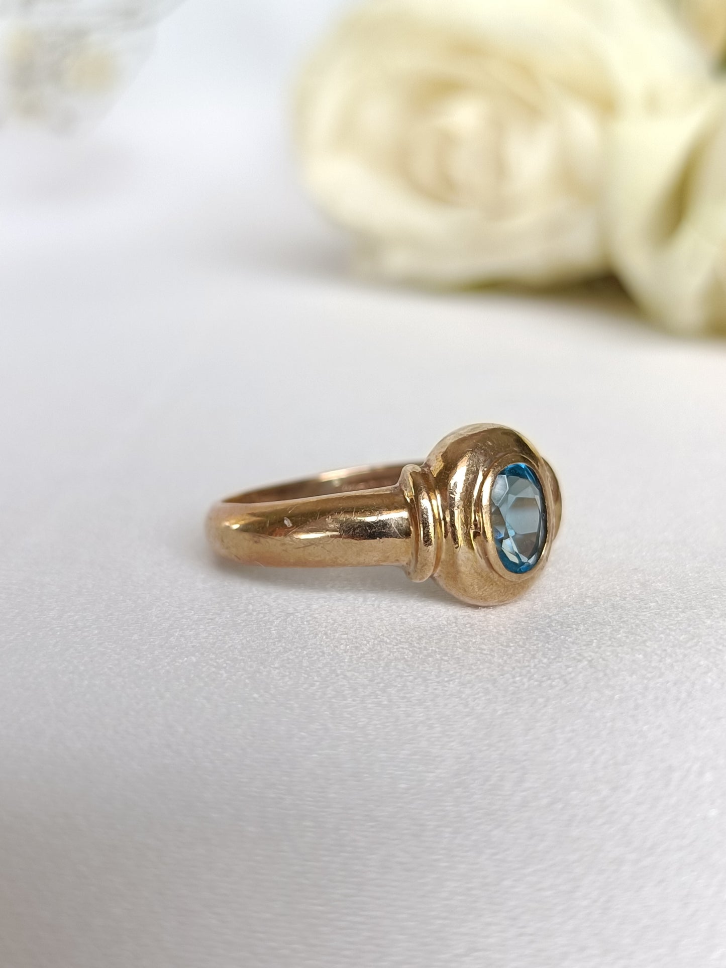 Solid 9ct yellow gold bezel set solitaire blue topaz ring size 7 US or N UK